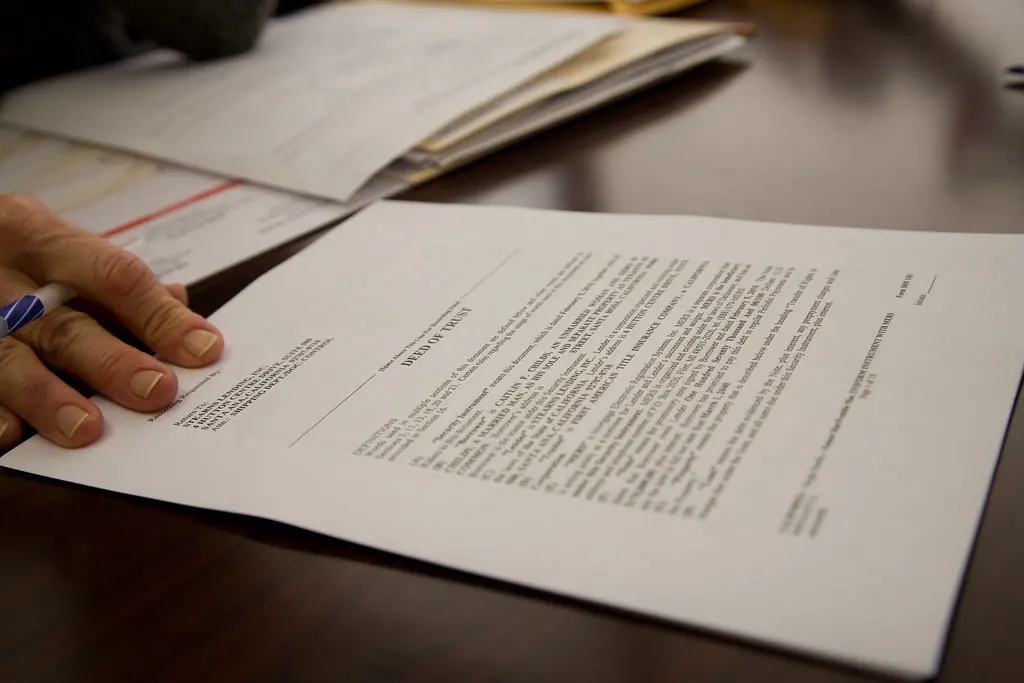 Reviewing paperwork at a signing appointment